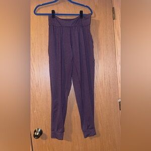 Under Armour Women's Tech Heathered Joggers in Purple
